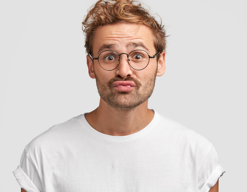 funny-curious-man-makes-grimace-purses-lips-looks-doubtfully 1 funny-curious-man-makes-grimace-purses-lips-looks-doubtfully 1